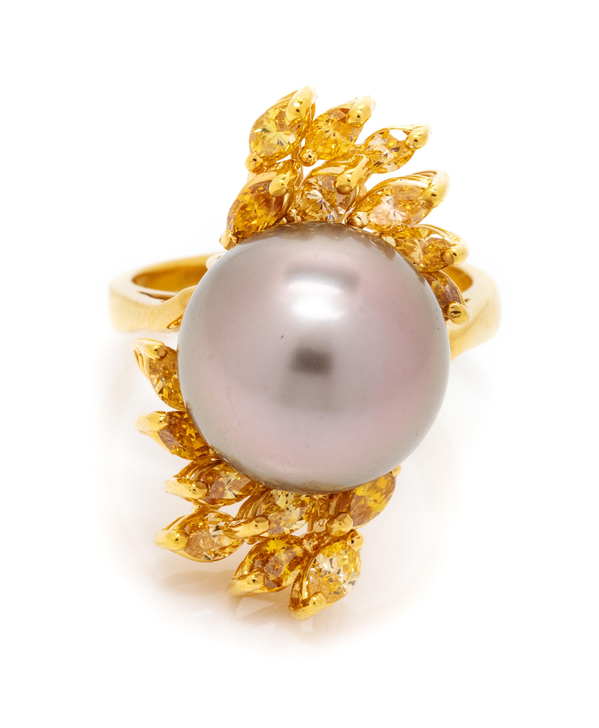 An 18 Karat Yellow Gold, Cultured South Sea Pearl and Colored Diamond Ring, 6.60 dwts.
