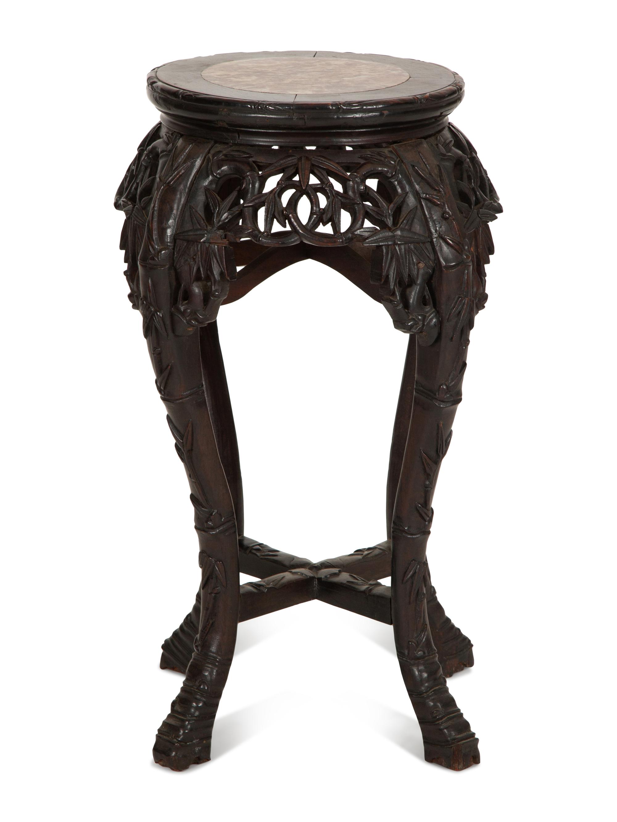 A Chinese Carved Hardwood Stand with Inset Marble Top