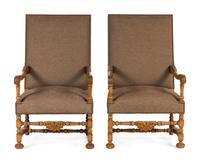 A Pair of Continental Baroque Style Carved Walnut Armchairs