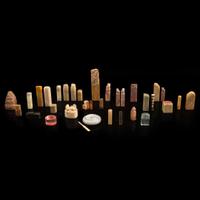 A group of 31 seals, a seal paste box, and two notebooks of seal impressions 印章一组三十一件连同印泥一盒及印谱两本 20th century ????