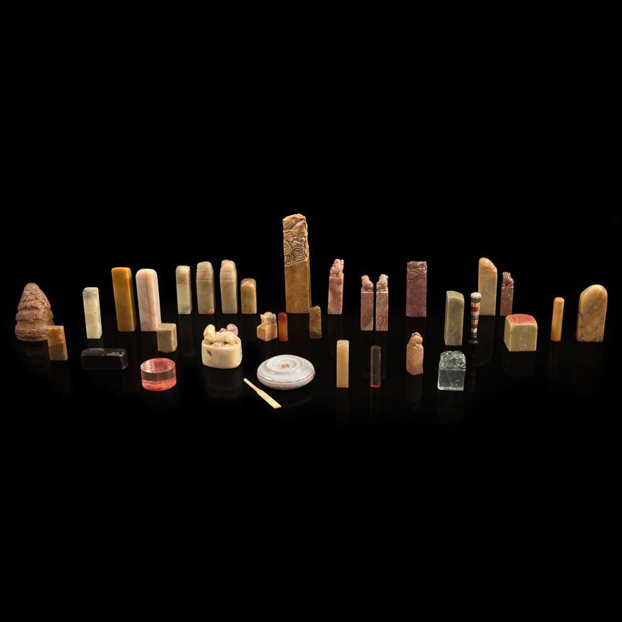 A group of 31 seals, a seal paste box, and two notebooks of seal impressions 印章一组三十一件连同印泥一盒及印谱两本 20th century ????