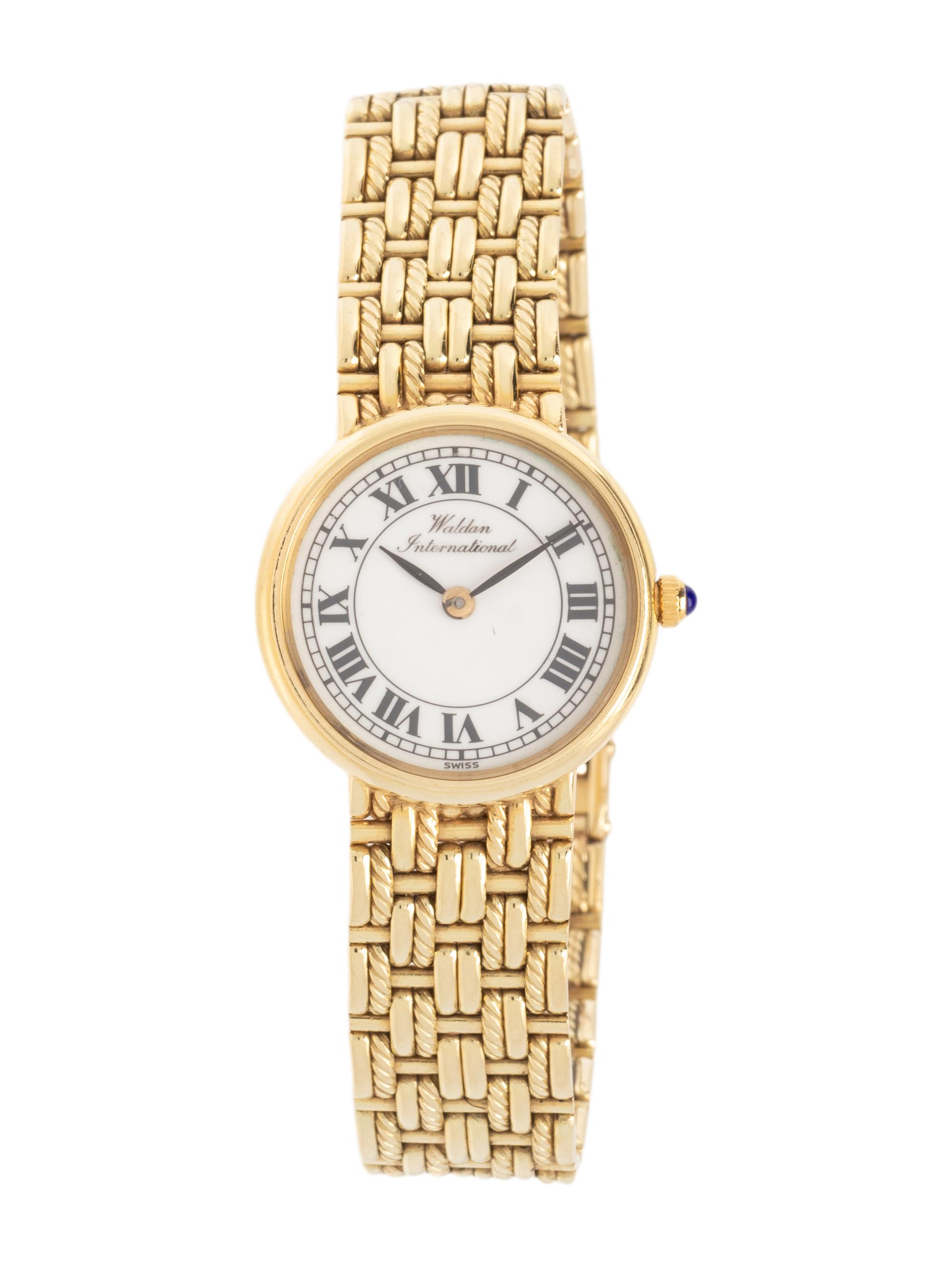 WALDAN INTERNATIONAL, 14K YELLOW GOLD WATCH