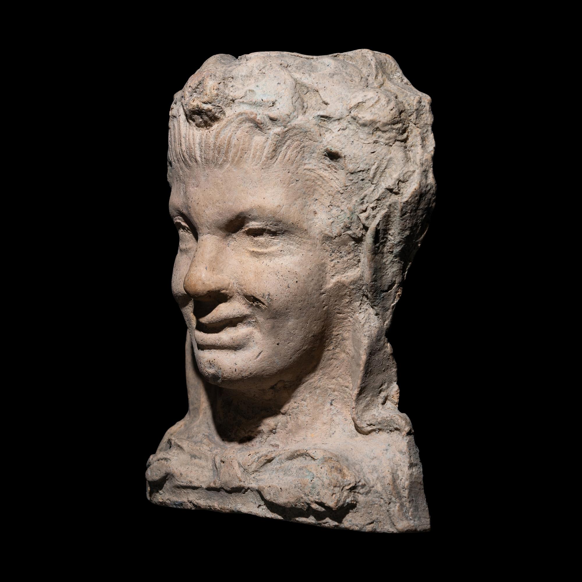 An Etruscan Terracotta Head of a Satyr