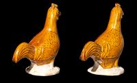 A Pair of Chinese Amber Glazed Pottery Figures of Standing Cockerels