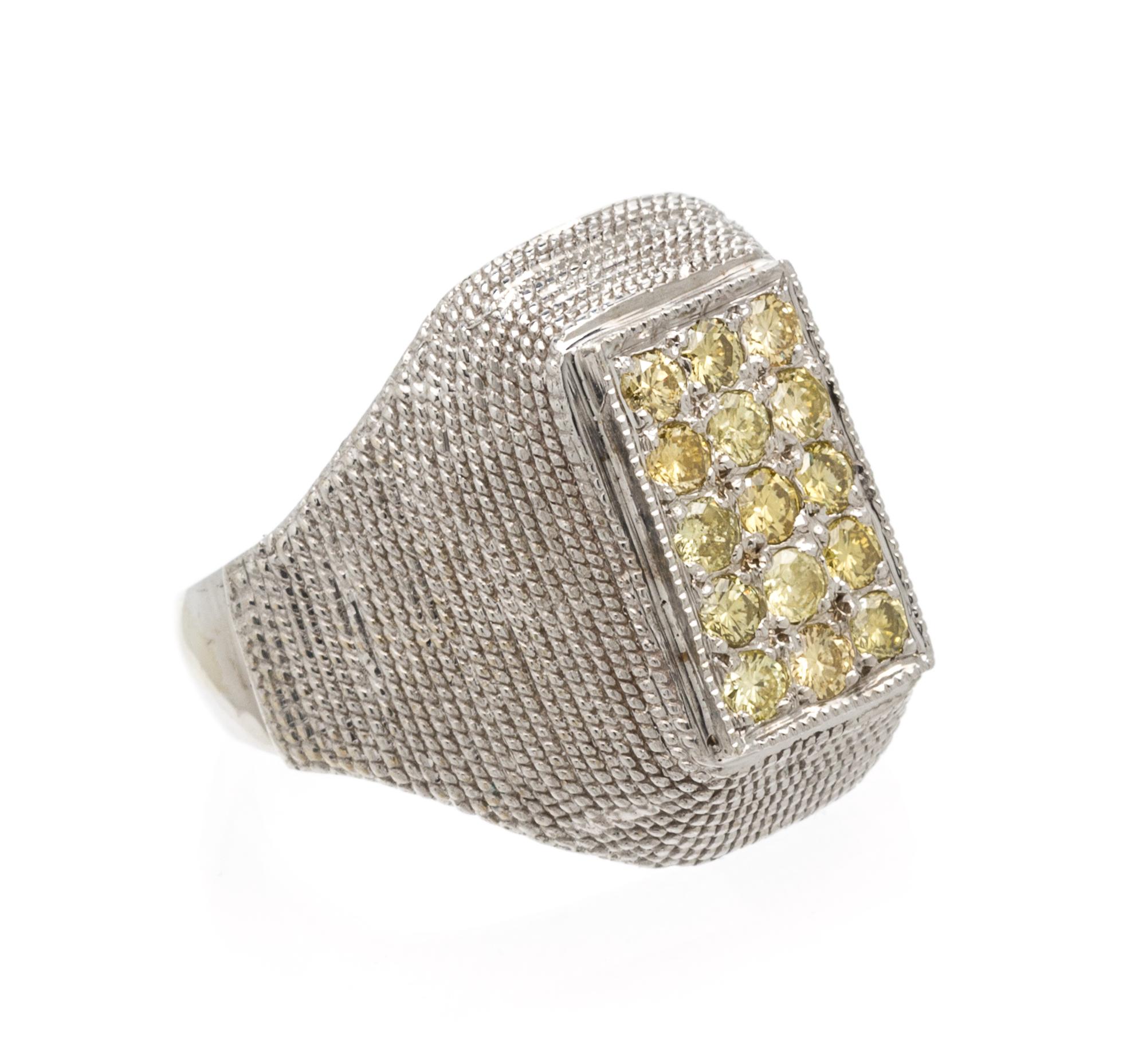A White Gold and Colored Diamond Ring, 4.60 dwts.