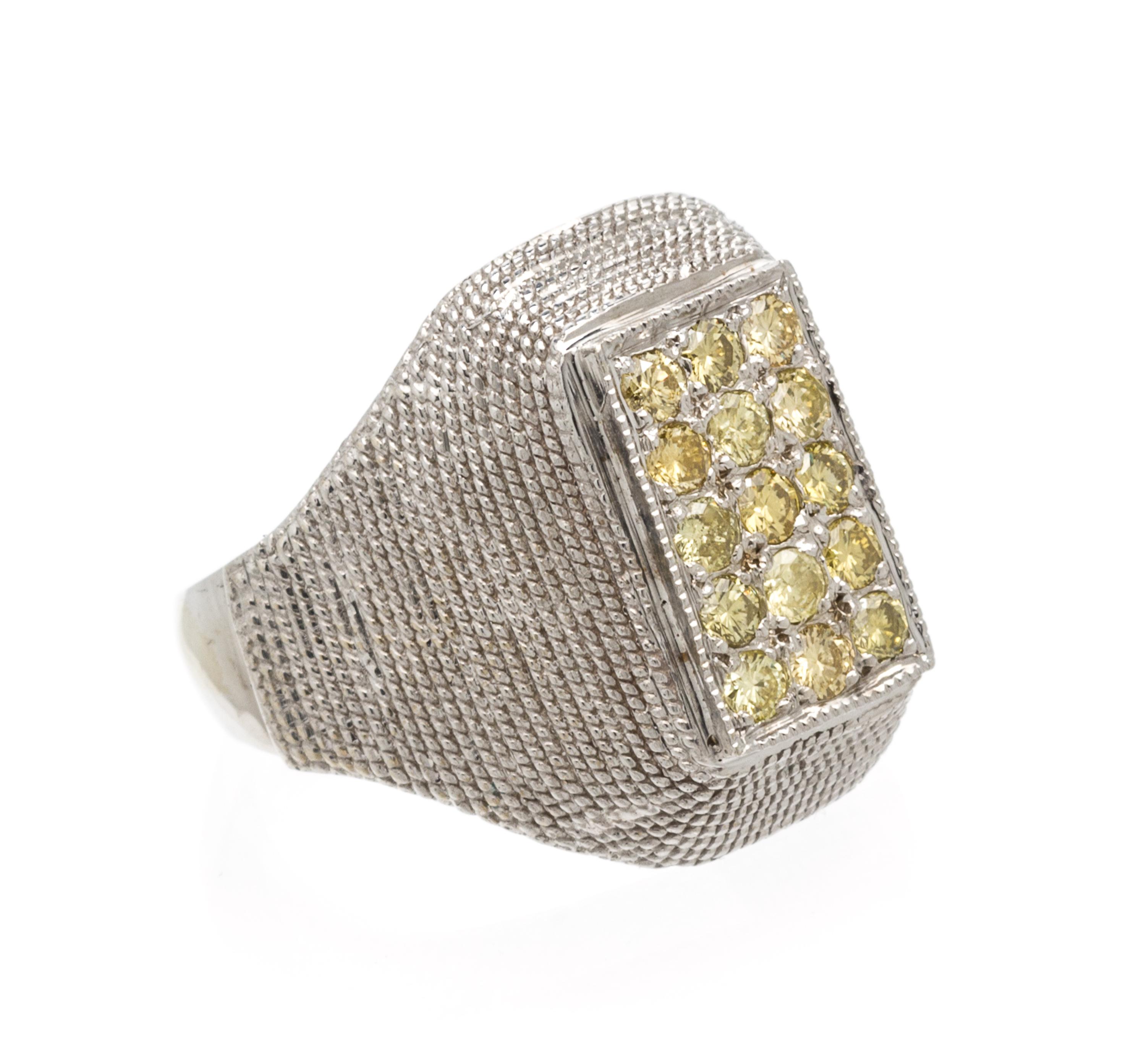A White Gold and Colored Diamond Ring, 4.60 dwts.