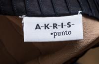 An Akris Punto Black Cotton Pleated Skirt Ensemble, Size 4.