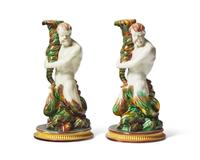 An Assembled Pair of Wedgwood Majolica Assembled Triton Candle Holders
