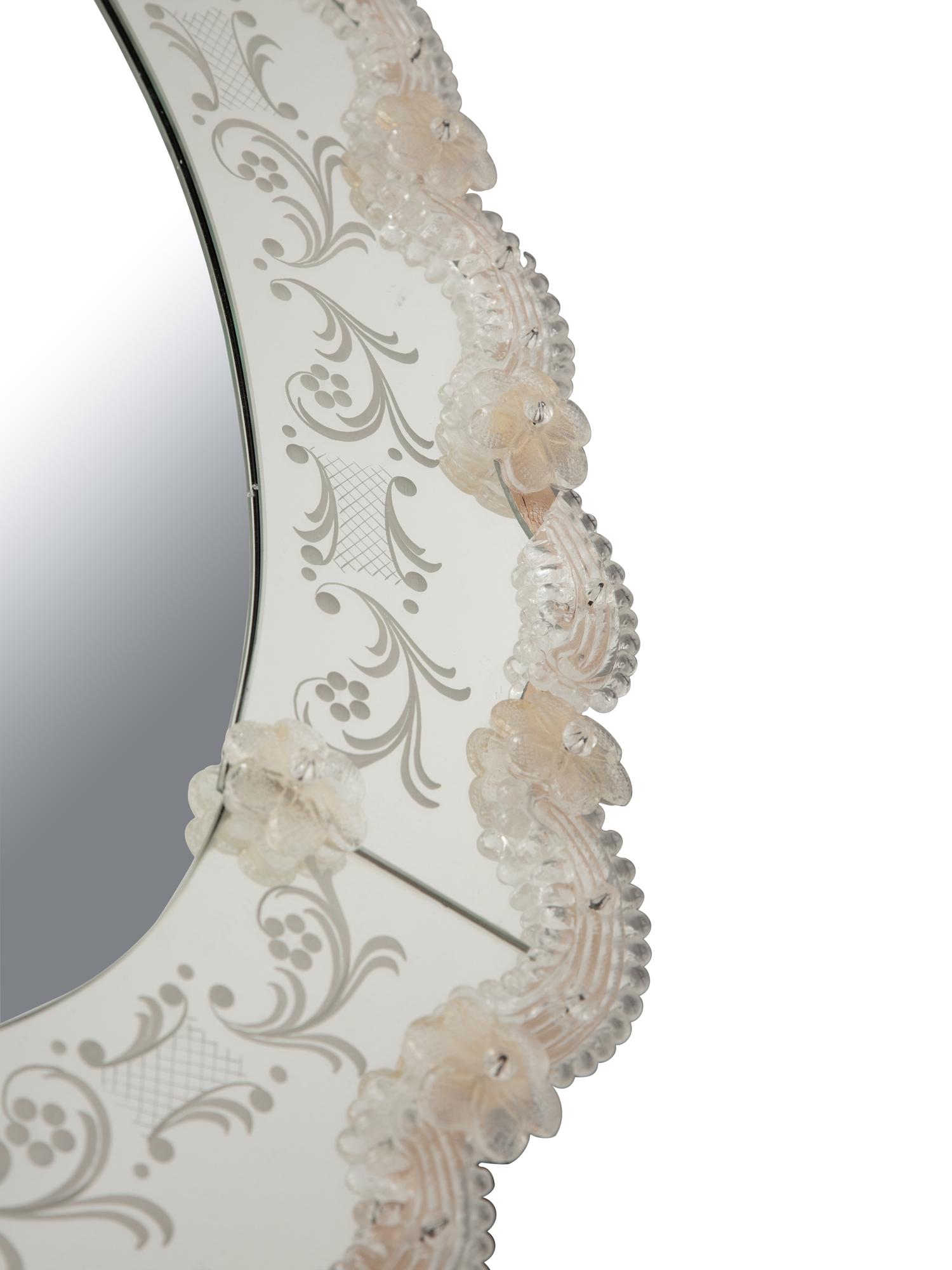 A Venetian Etched Glass Oval Mirror with Floral Accents