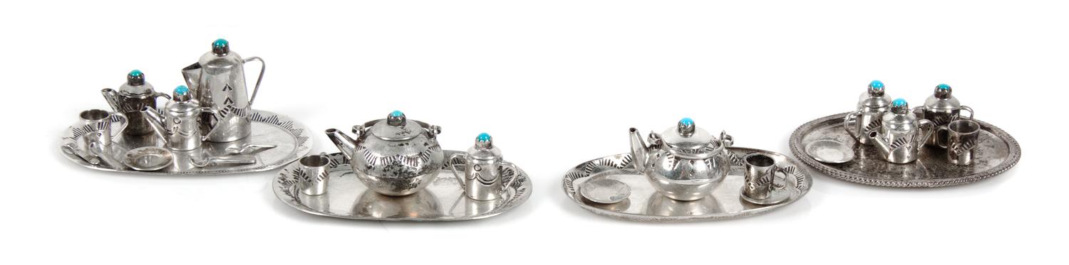 A Group of Native American Silver Tea and Coffee Articles, Elizabeth Whitman, Navajo, comprising a teapot, a coffee pot, two creamers,