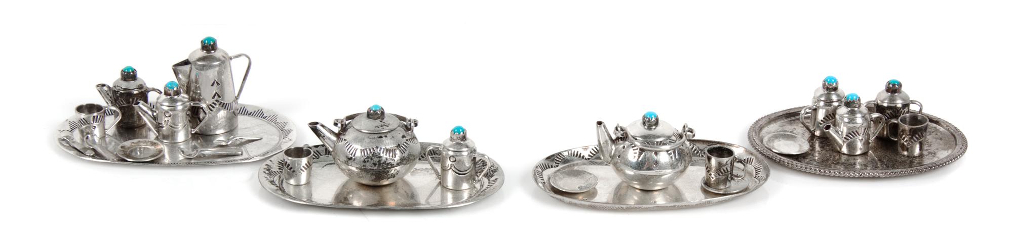 A Group of Native American Silver Tea and Coffee Articles, Elizabeth Whitman, Navajo, comprising a teapot, a coffee pot, two creamers,
