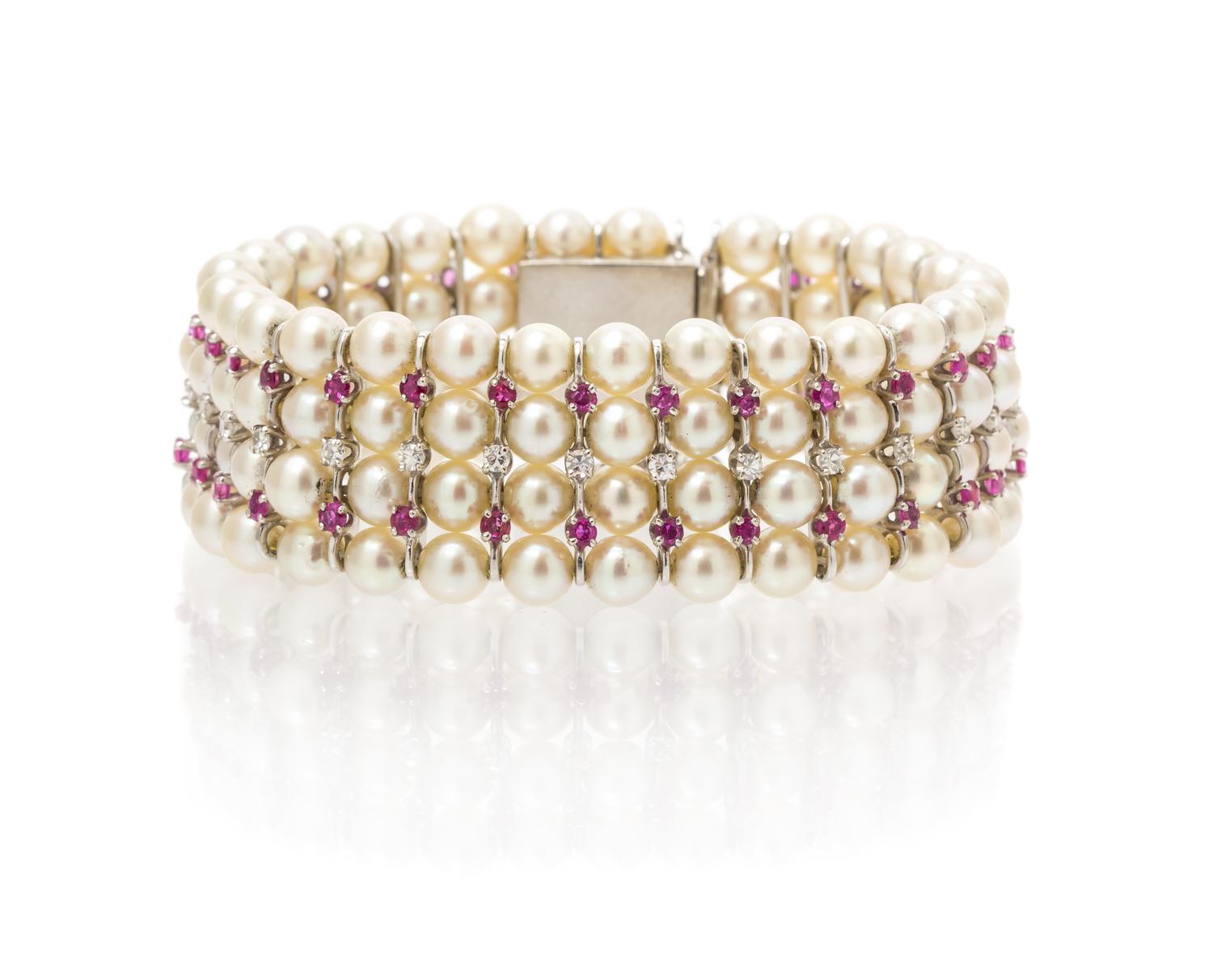 A White Gold, Ruby, Diamond and Cultured Pearl Bracelet, 28.50 dwts.