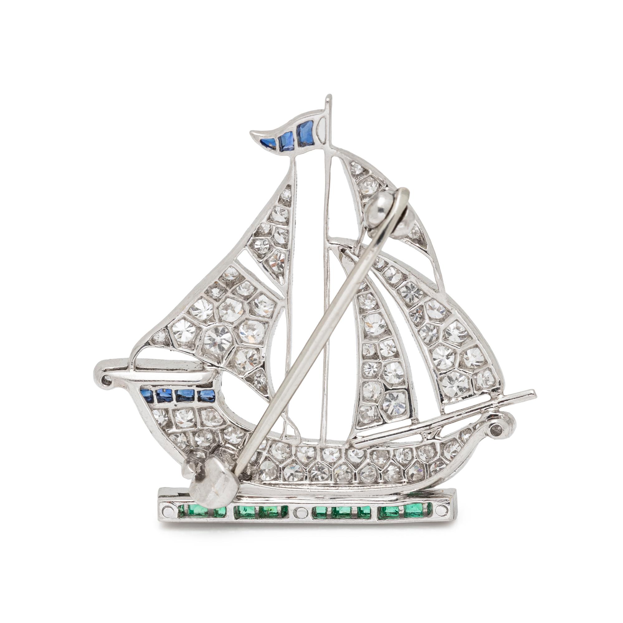 ART DECO, DIAMOND, EMERALD AND SAPPHIRE SAILBOAT BROOCH