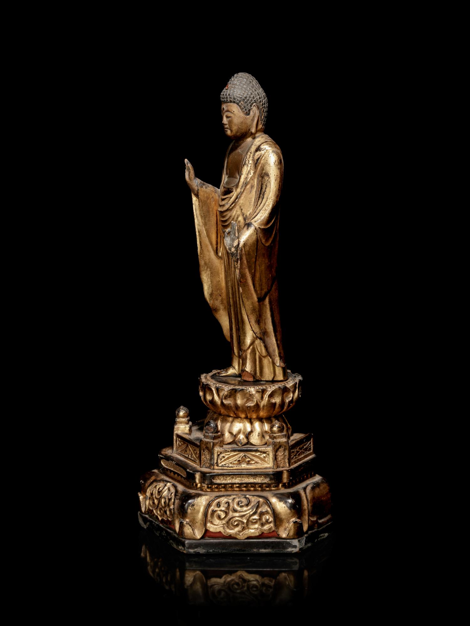 A Hardwood Shrine with a Gilt Wood Figure of Buddha