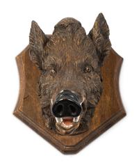 A Black Forest Carved Boar Head Mount