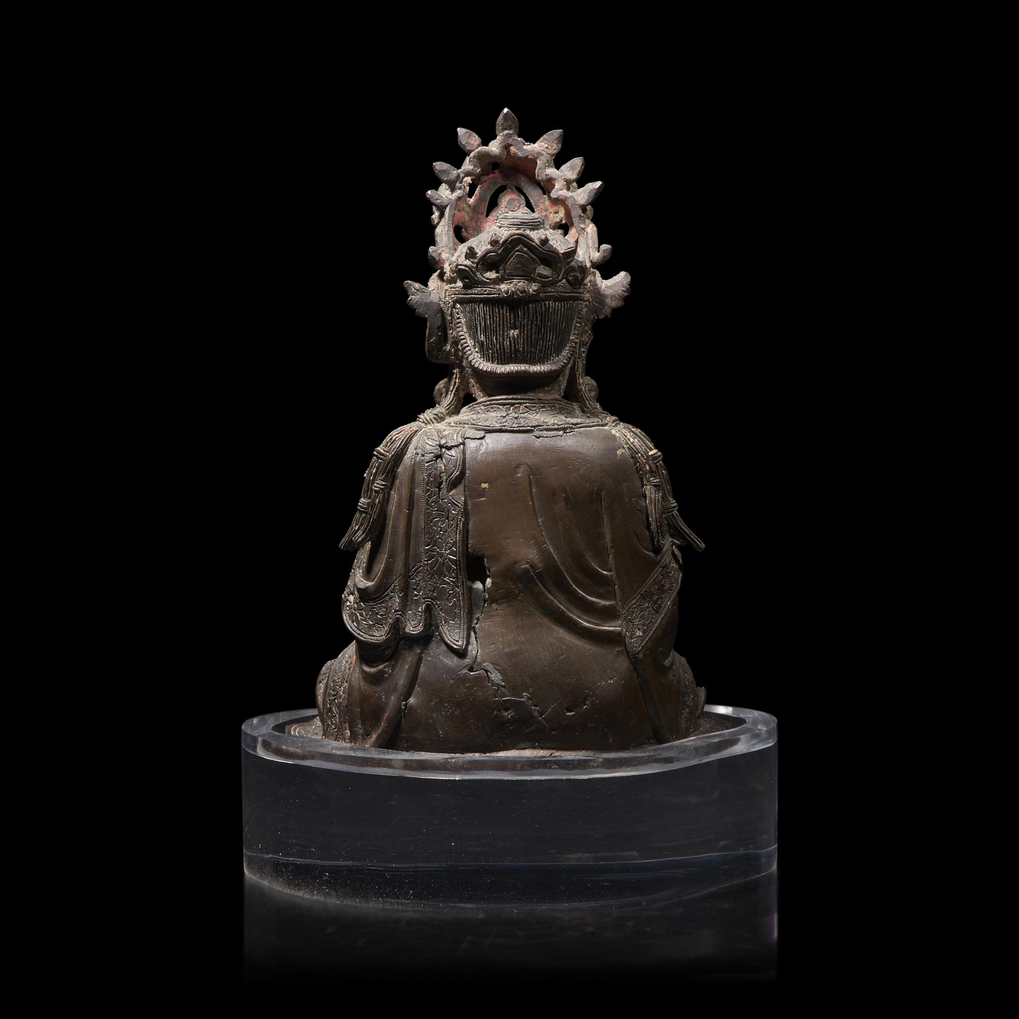 A Chinese Bronze Figure of Guanyin Seated, Ming Dynasty or Later 明或更晚 銅觀音坐像
