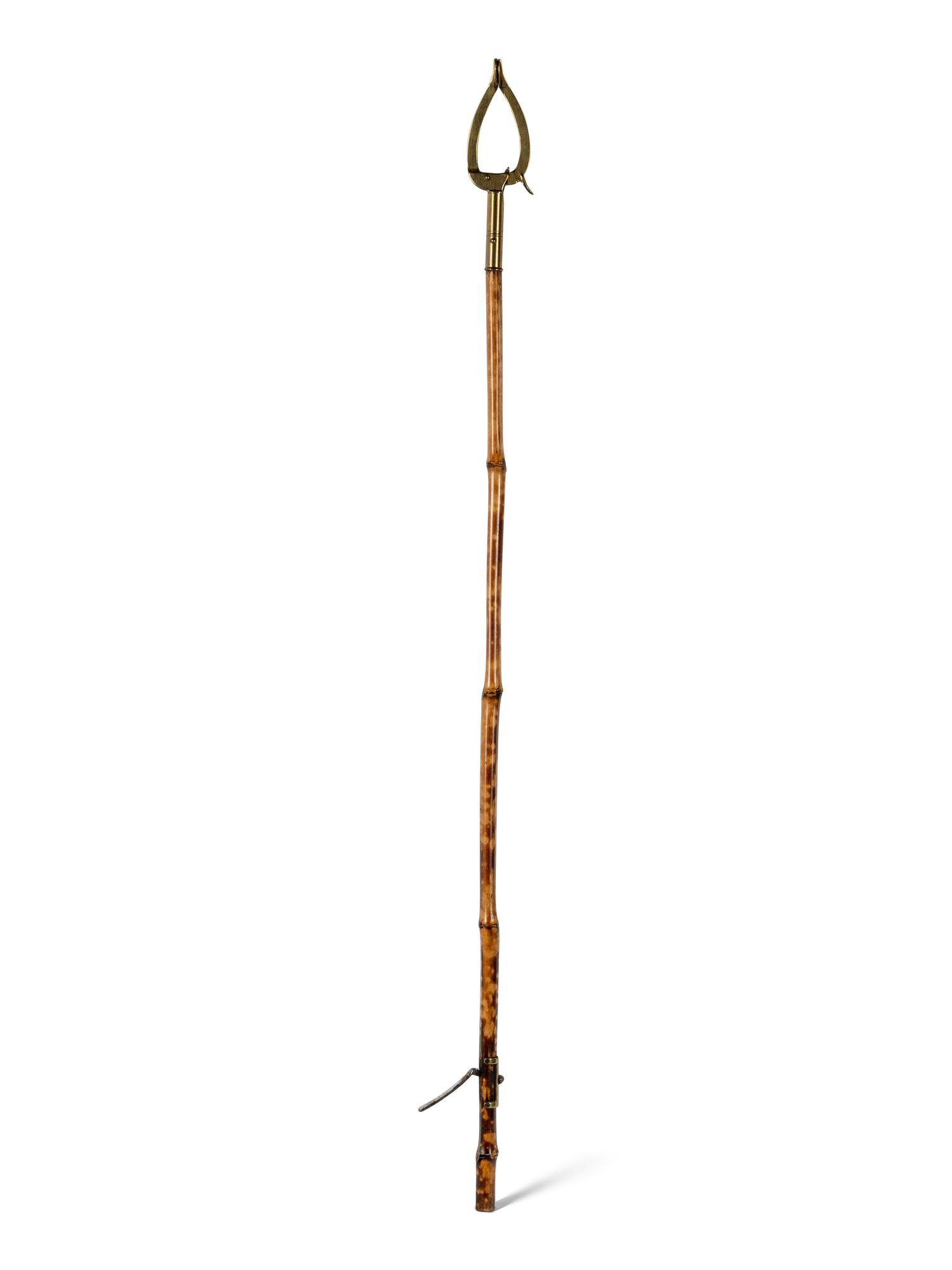 A Victorian Brass Mounted Bamboo Reaching Clamp