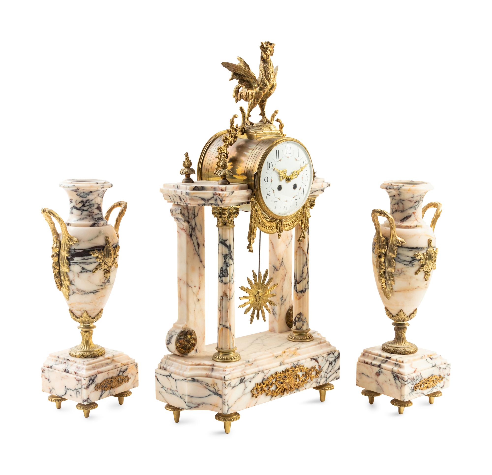 A French Gilt Bronze and Marble Three-Piece Clock Garniture