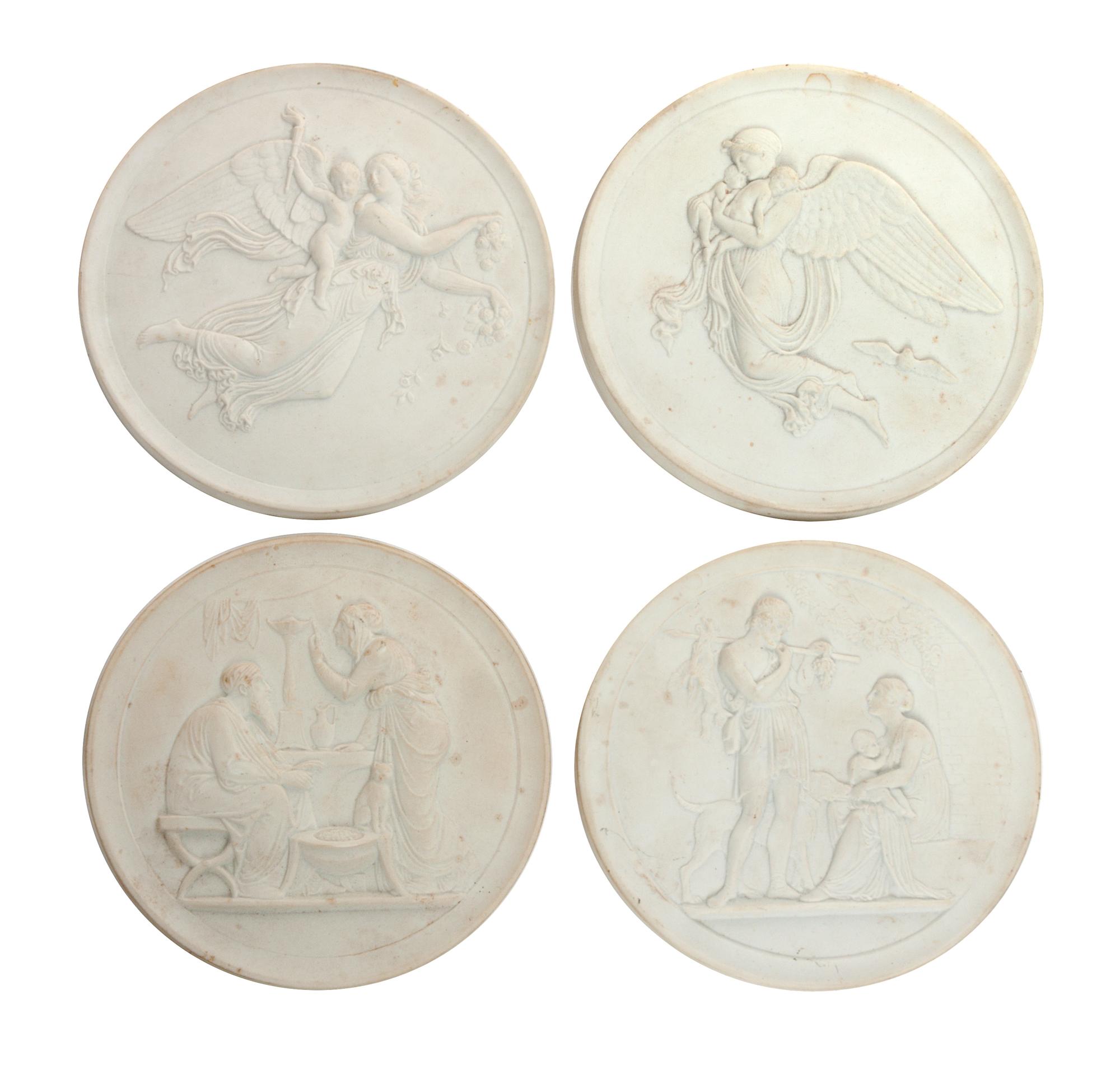 Four Royal Copenhagen Bisque Rondels Diameter 5 1/2 inches.