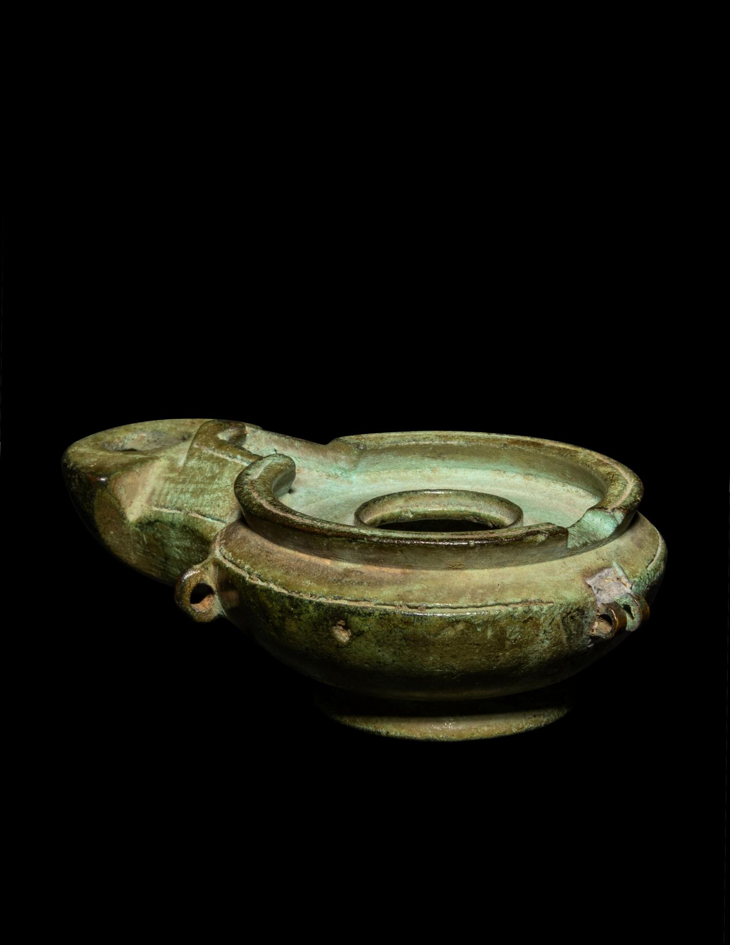 A Roman Bronze Oil Lamp