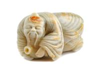 A Chinese Carved Jadeite Figure Height 3 inches.