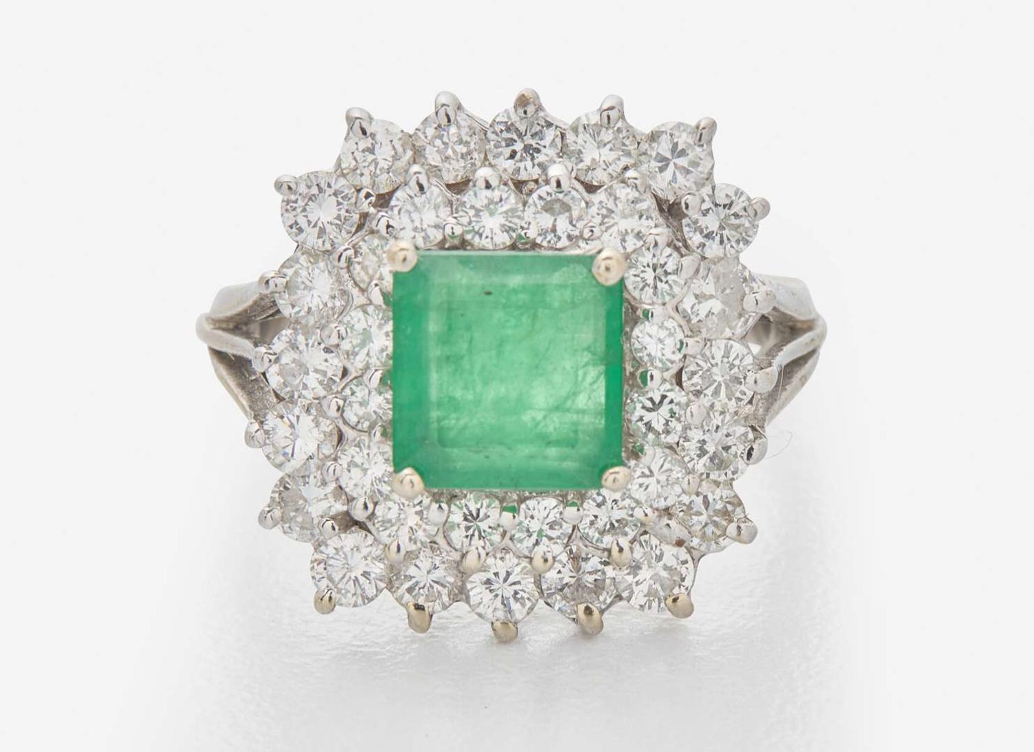 An 18K White Gold, Emerald, and Diamond Ring