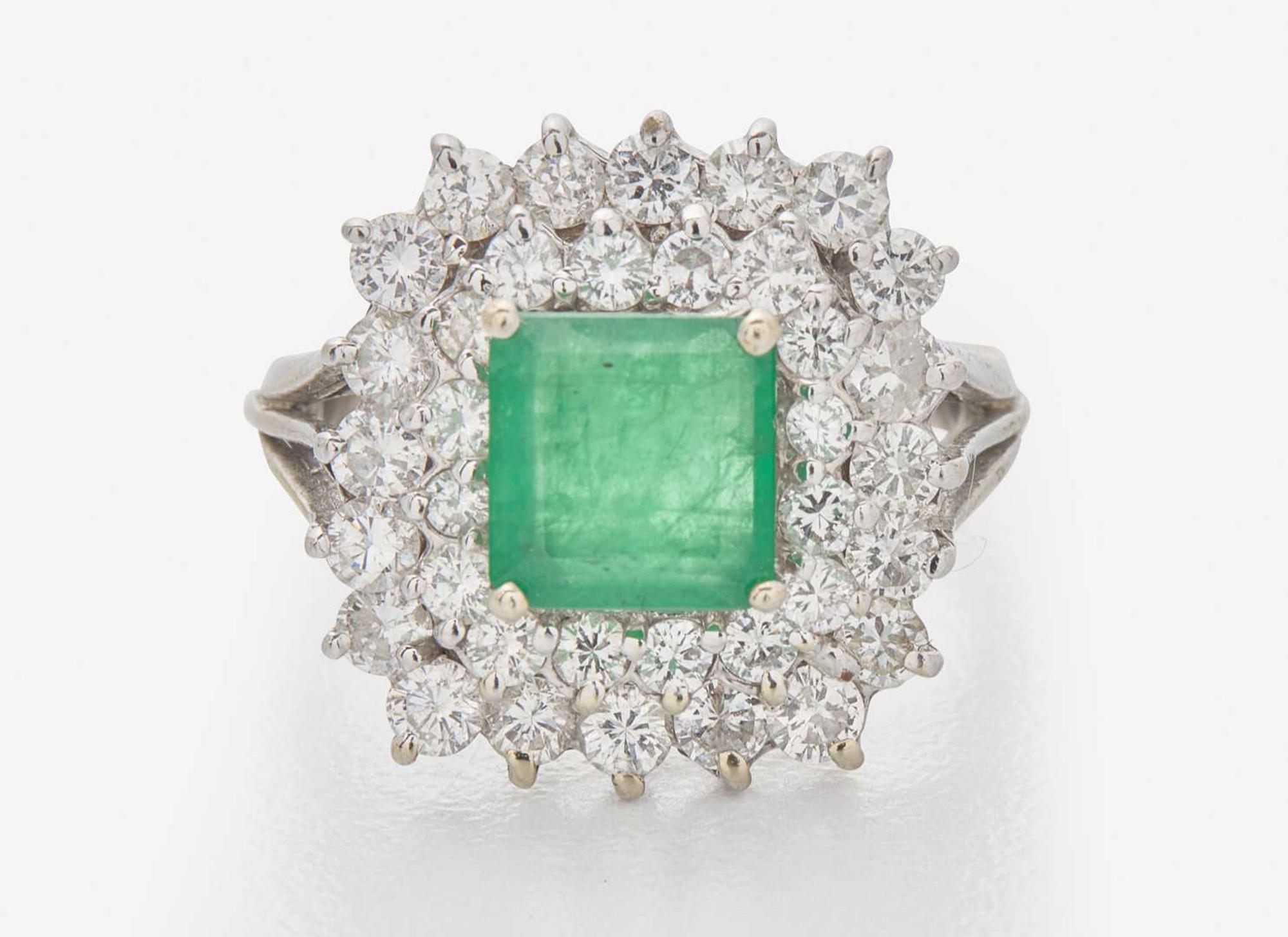 An 18K White Gold, Emerald, and Diamond Ring