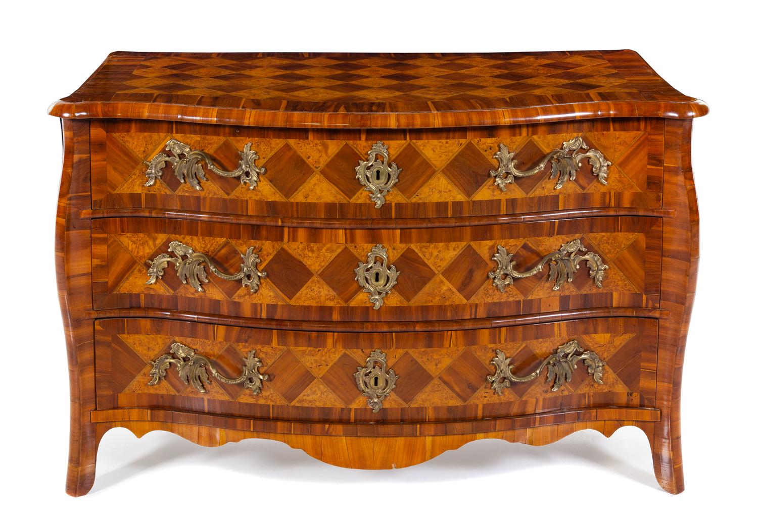 A Continental Parquetry Commode Height 33 x width 50 x depth 27 inches. — PROBABLY GERMAN OR AUSTRIAN, EARLY 19TH CENTURY