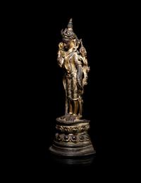 A Tibetan Parcel-Gilt Bronze Figure of Avalokiteshvara