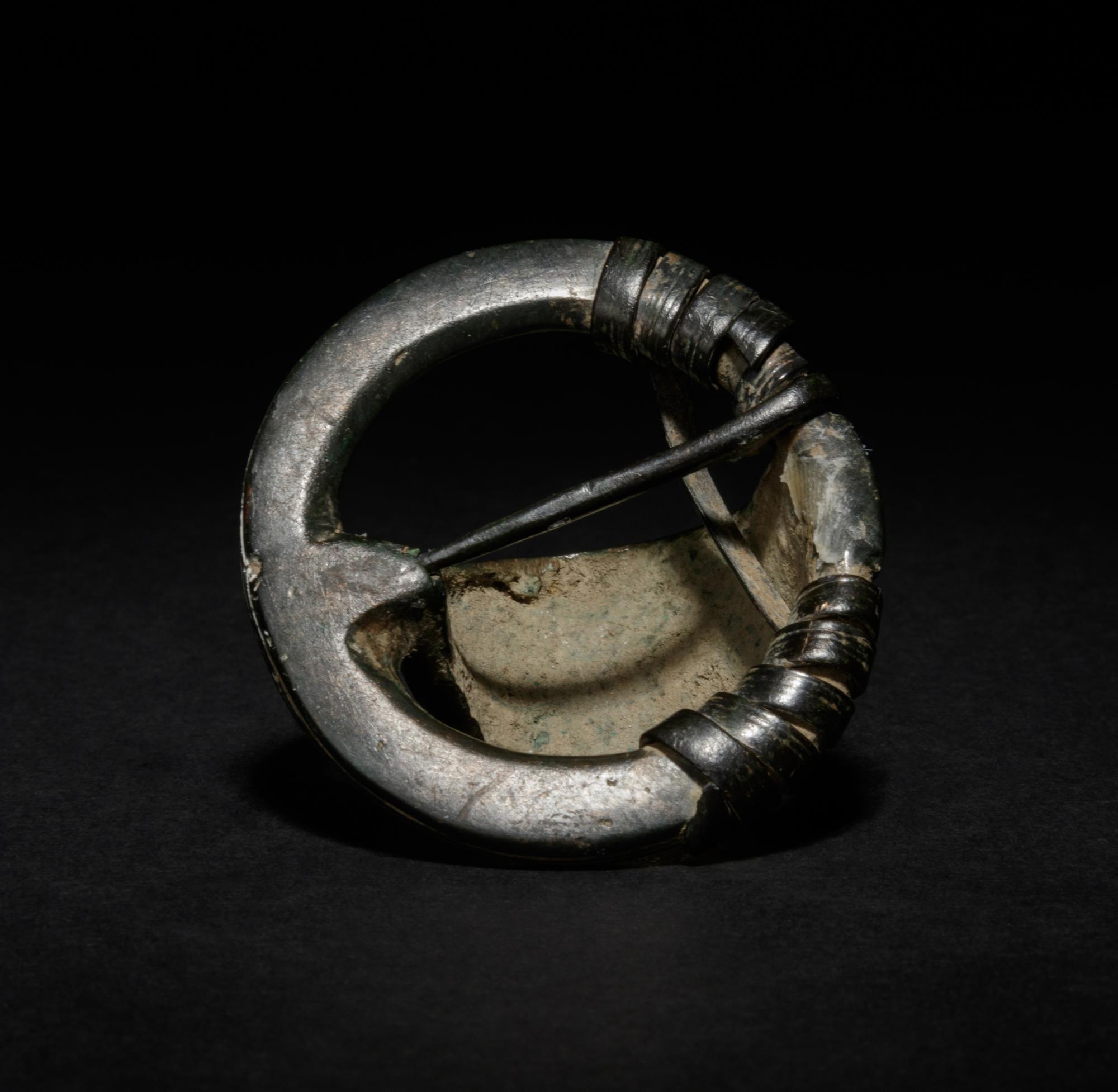 A Celtiberian Bronze Penannular Cupola Fibula