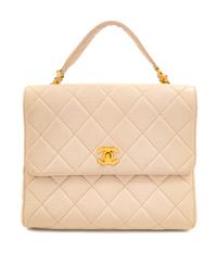 A Chanel Cream Lambskin Quilted Square Flap Bag, 8" H x 9.5" W x 3" D; Handle drop: 3".