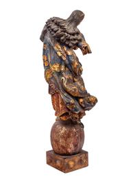 A Continental Carved, Polychromed and Parcel Gilt Figural Group