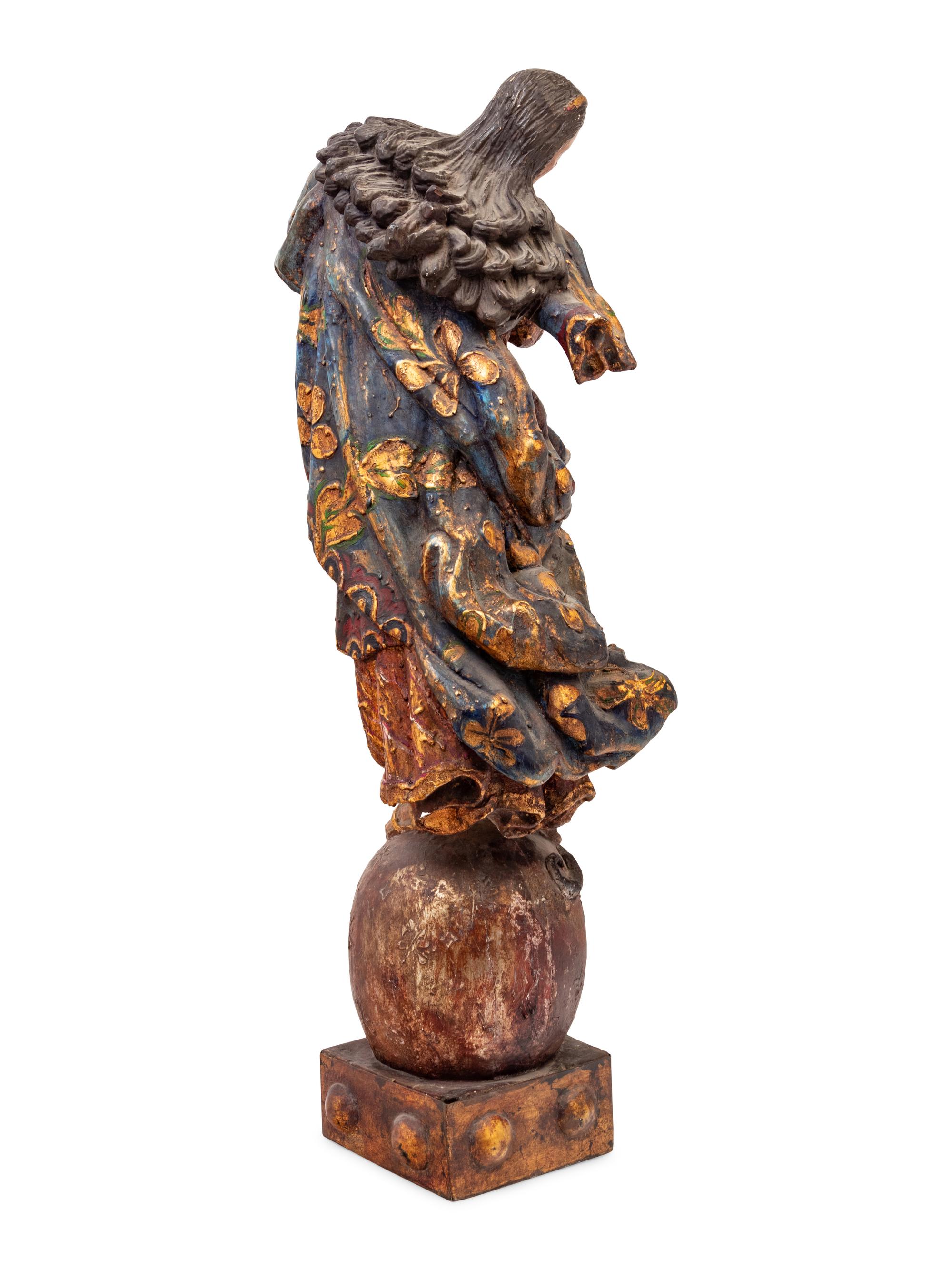 A Continental Carved, Polychromed and Parcel Gilt Figural Group