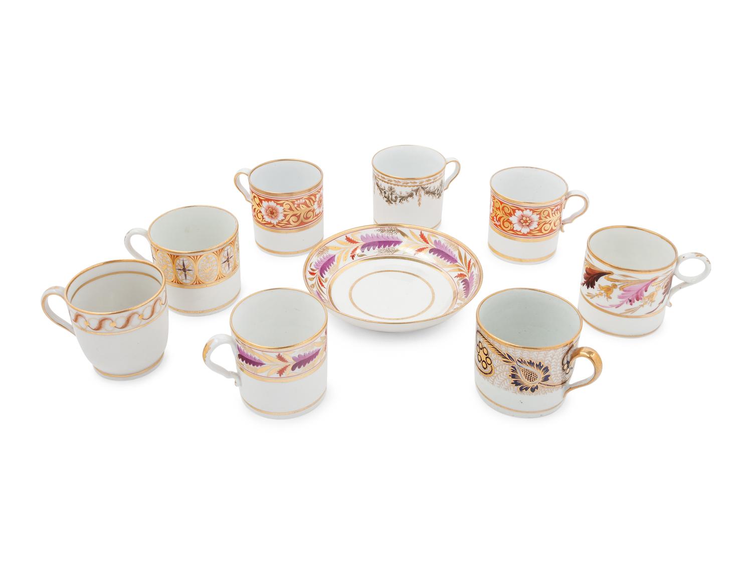 A Group of Eight English Porcelain Coffee Canns