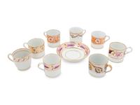 A Group of Eight English Porcelain Coffee Canns