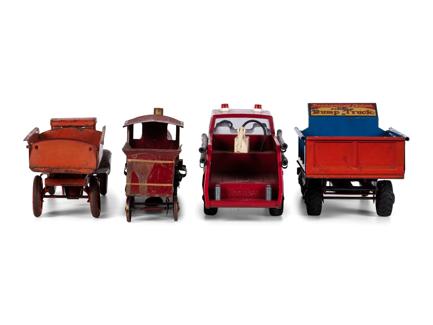 Three Pressed Steel and Tin Truck Toys