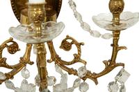 A Pair of Gilt Metal and Cut Glass Three-Light Wall Lights