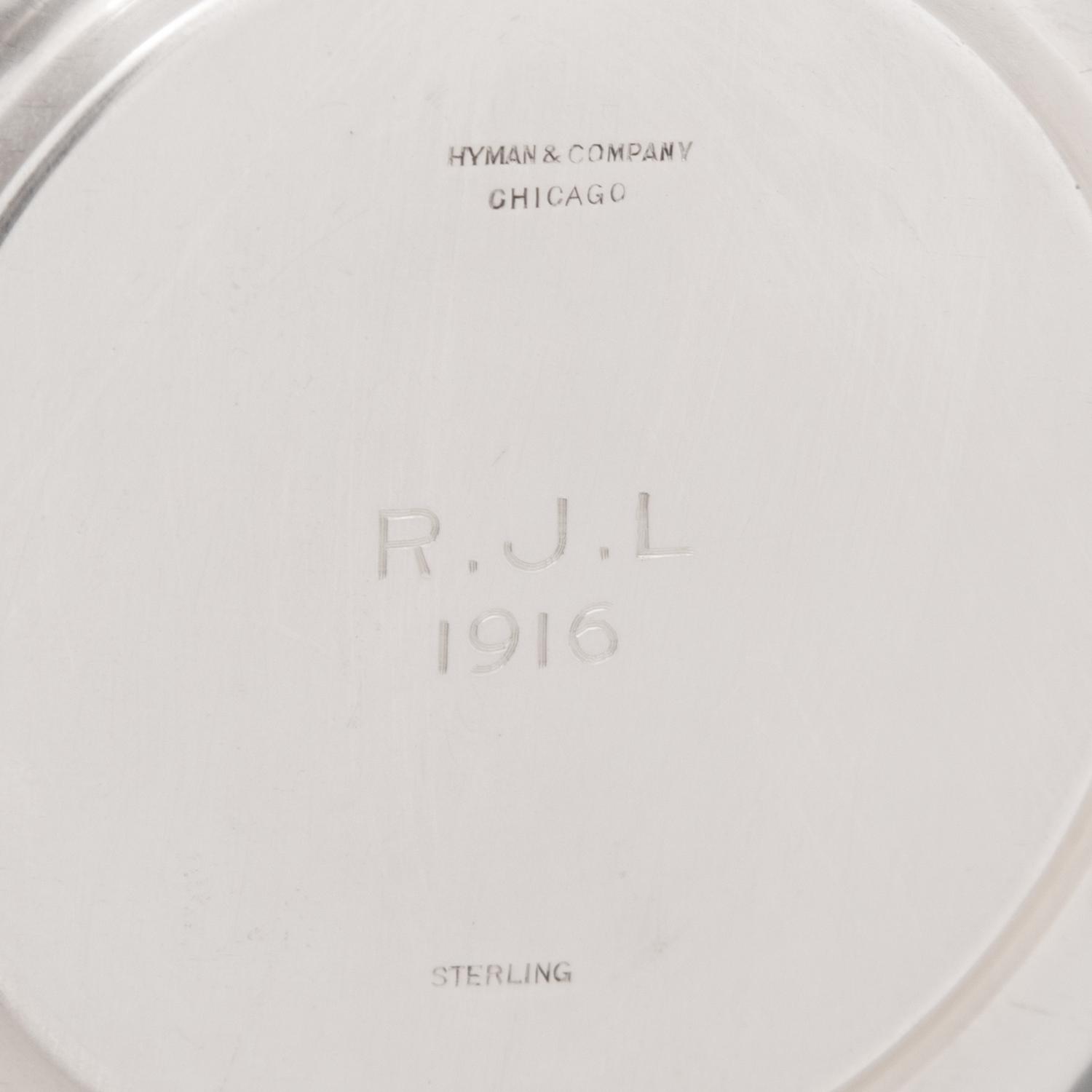 A Group of American Silver Cups and Saucers