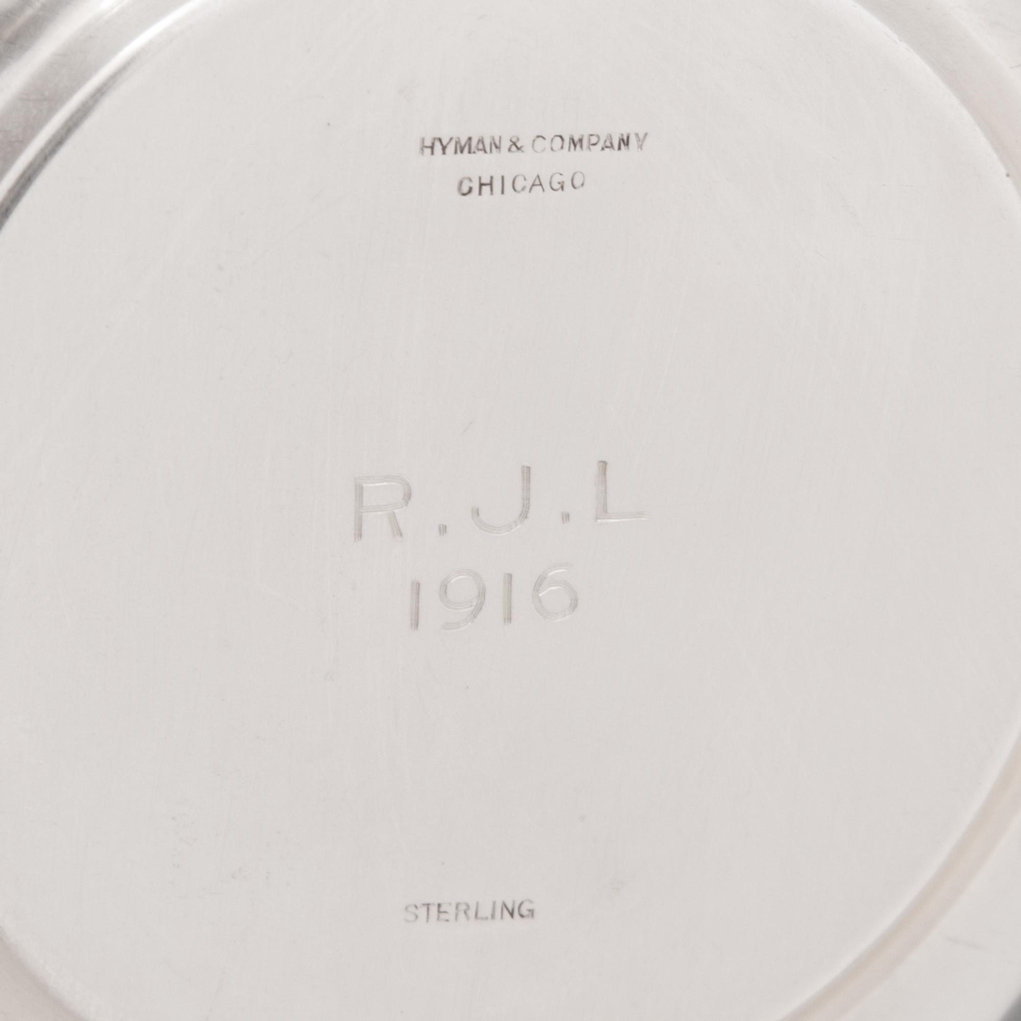A Group of American Silver Cups and Saucers