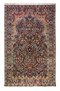 A Kirman Wool Rug 7 feet 10 inches x 4 feet 11 inches.