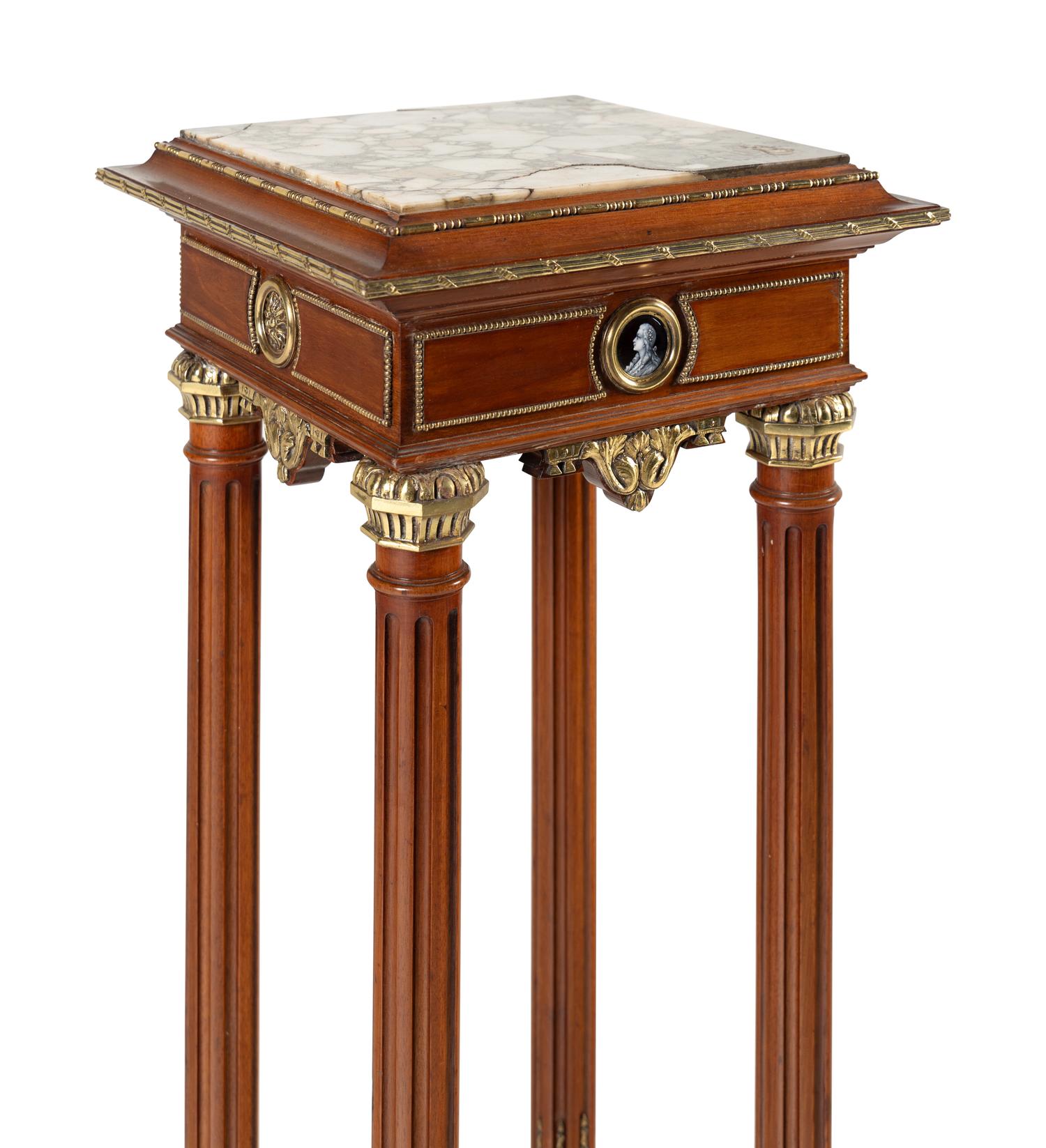 A Continental Gilt Bronze and Enamel Medallion Mounted Mahogany Marble-Top Pedestal