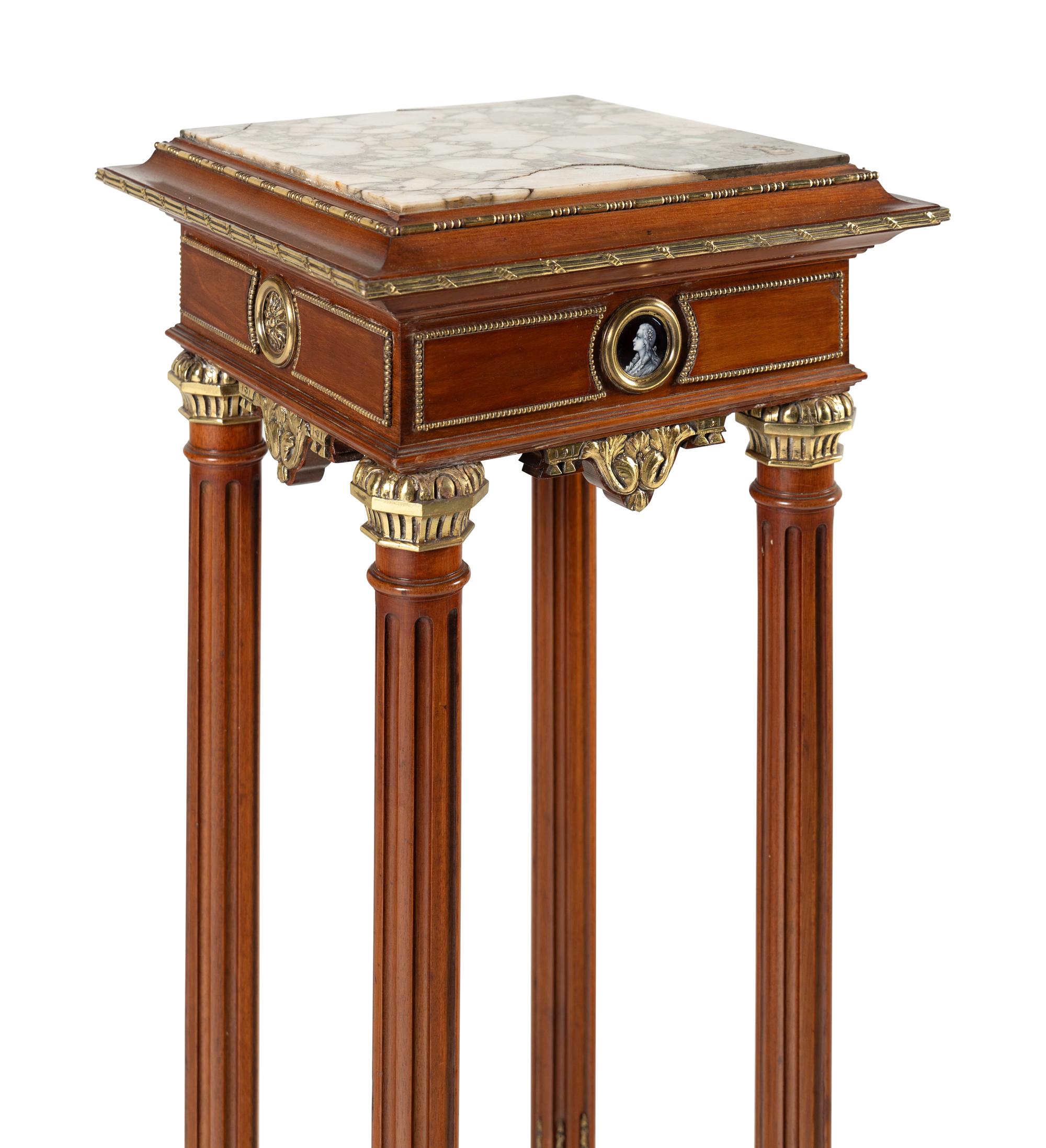 A Continental Gilt Bronze and Enamel Medallion Mounted Mahogany Marble-Top Pedestal