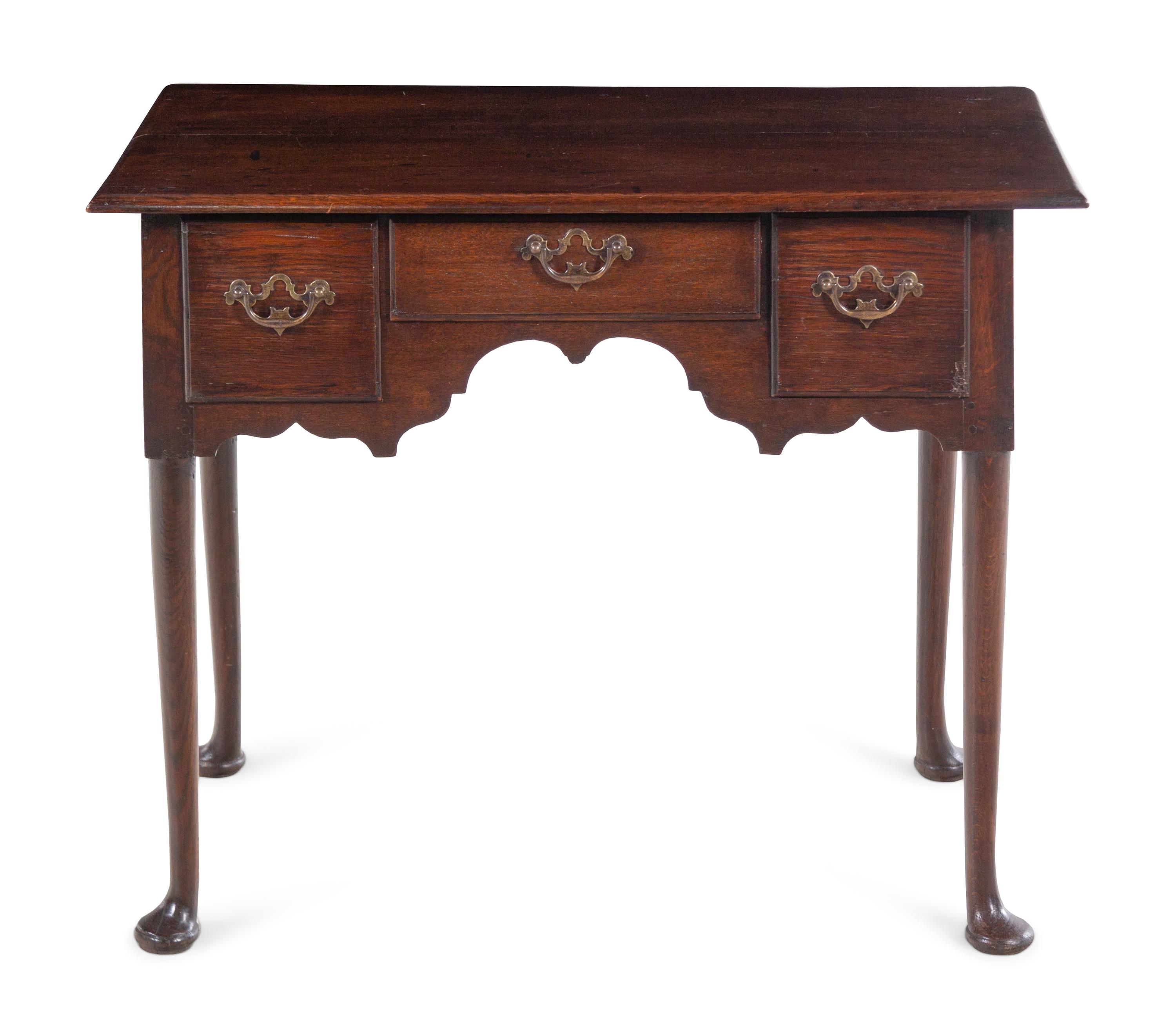 A Queen Anne Carved Oak Dressing Table