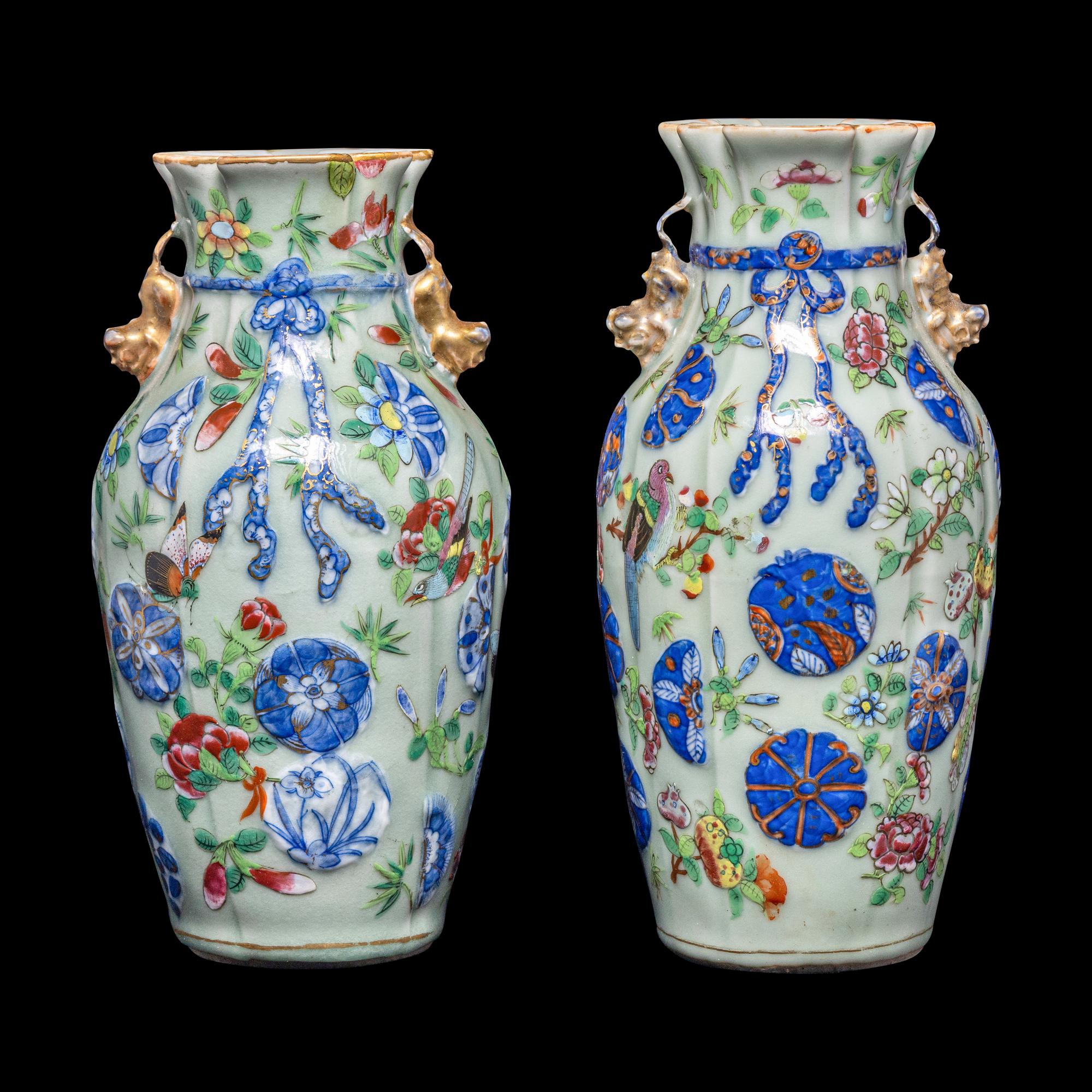 A Matched Pair of Chinese Celadon Ground Famille Rose Porcelain Vases