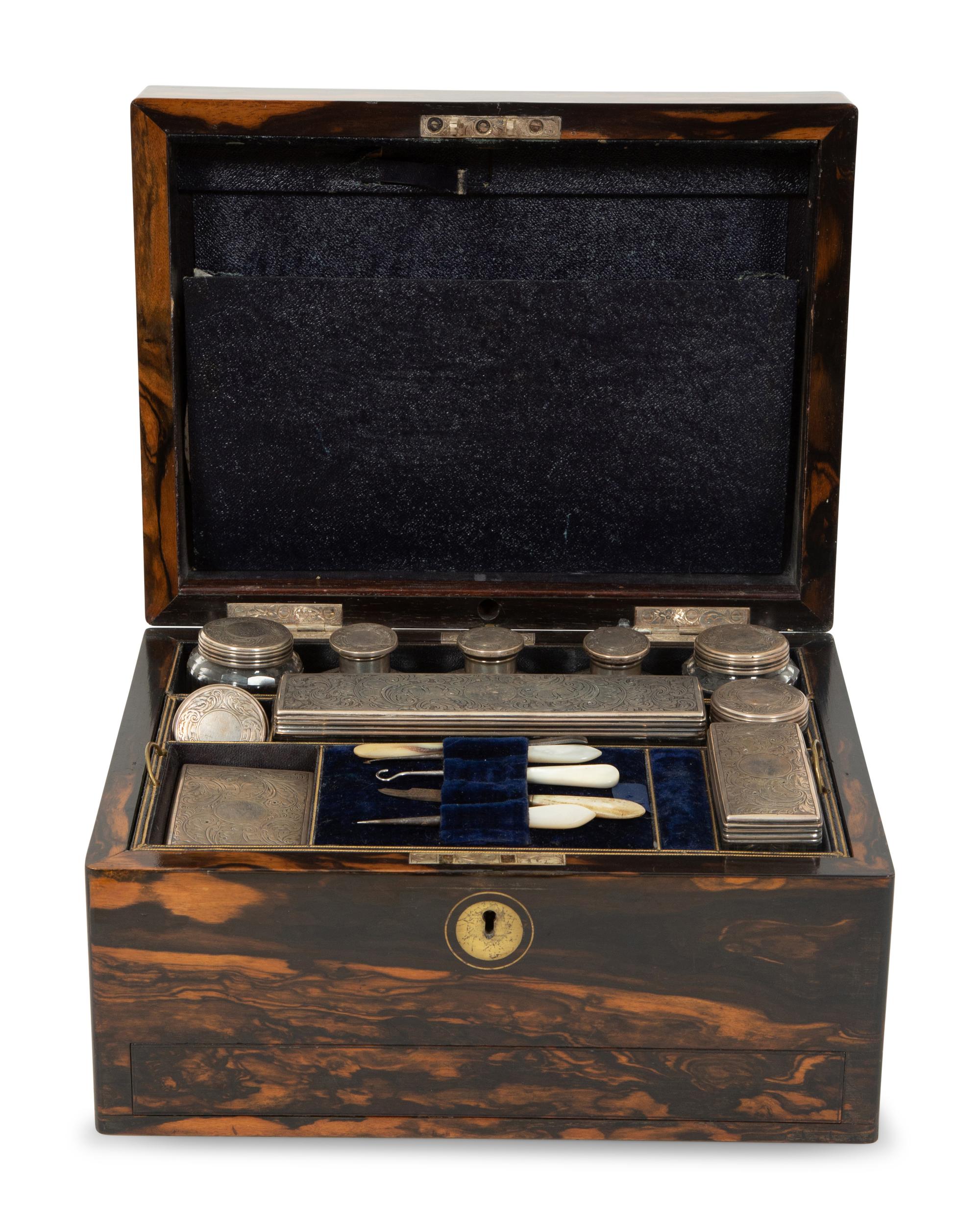 A Victorian Calamander Dressing Case with Silver Mounted Glass Articles