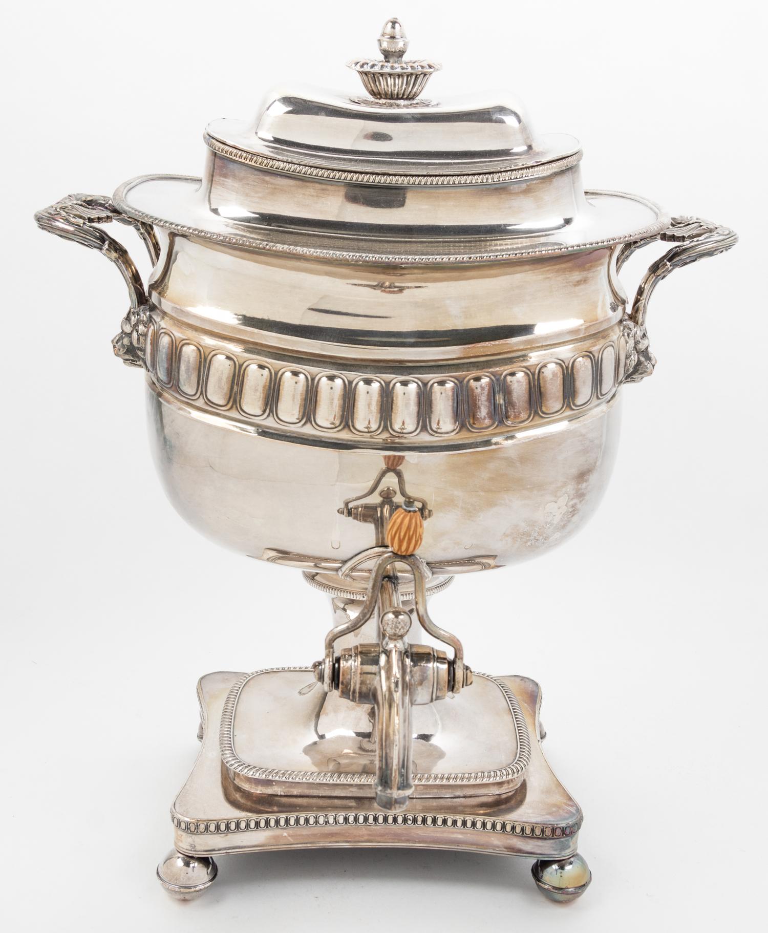 A Silver-plate Handled Hot Water Urn Height 16 inches.