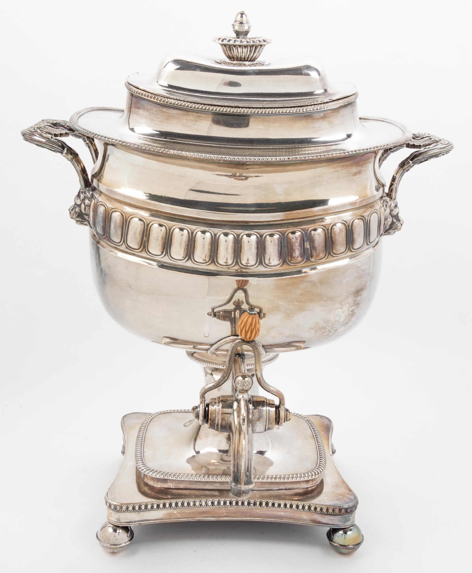 A Silver-plate Handled Hot Water Urn Height 16 inches.