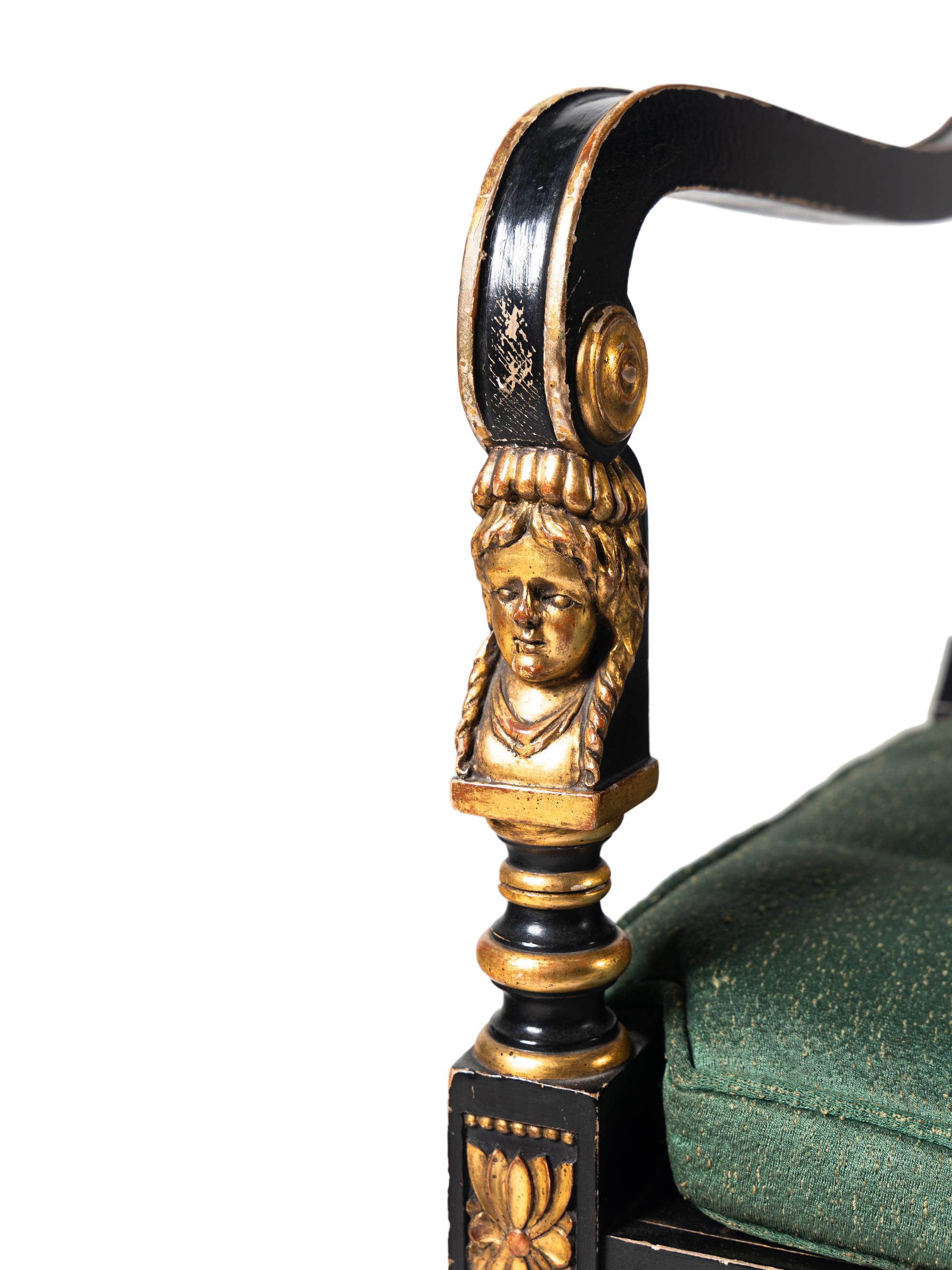 A Pair of Empire Style Ebonized and Parcel Gilt Curule Form Armchairs