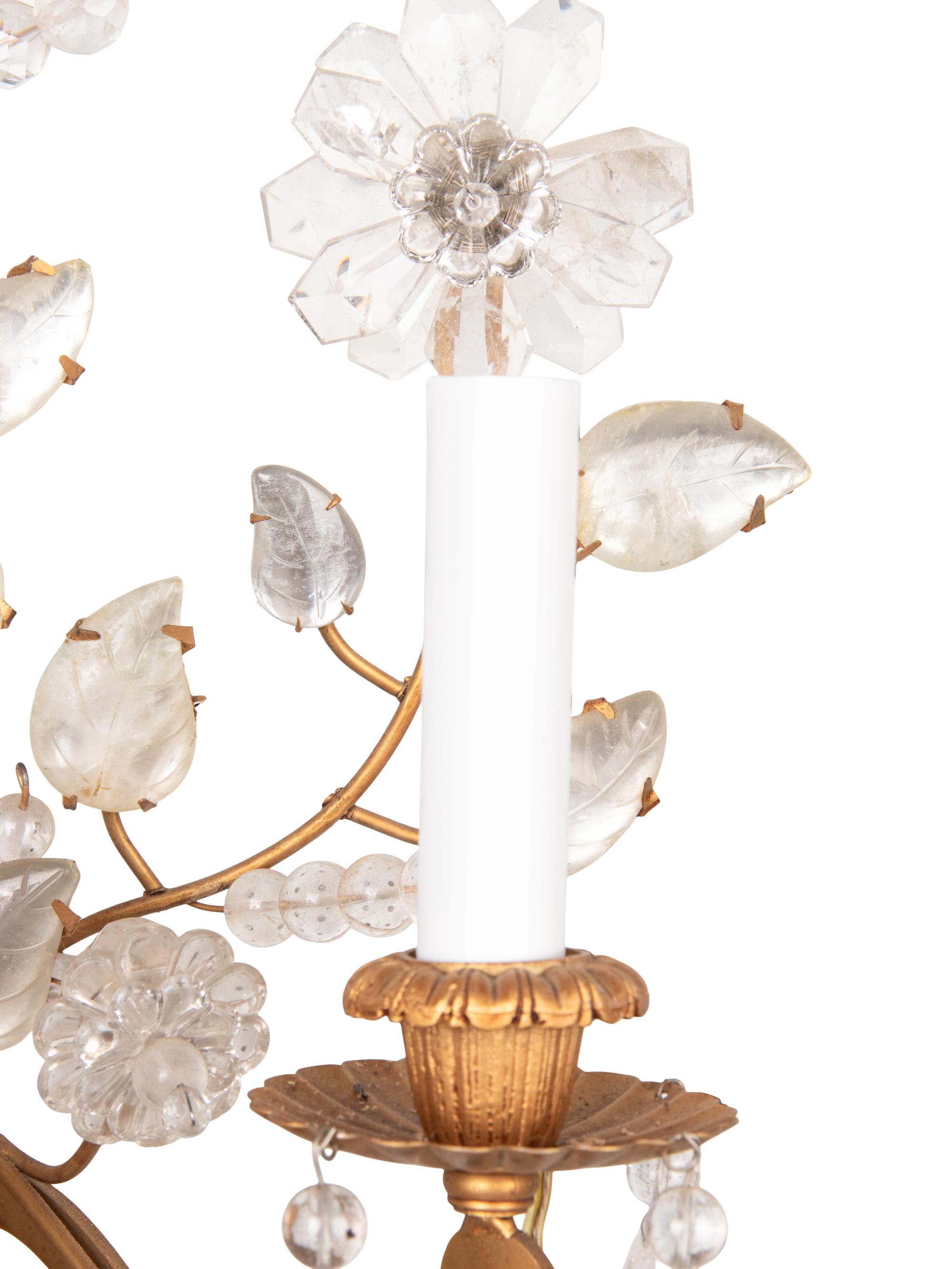 A Pair of Gilt Metal and Rock Crystal Three-Light Sconces