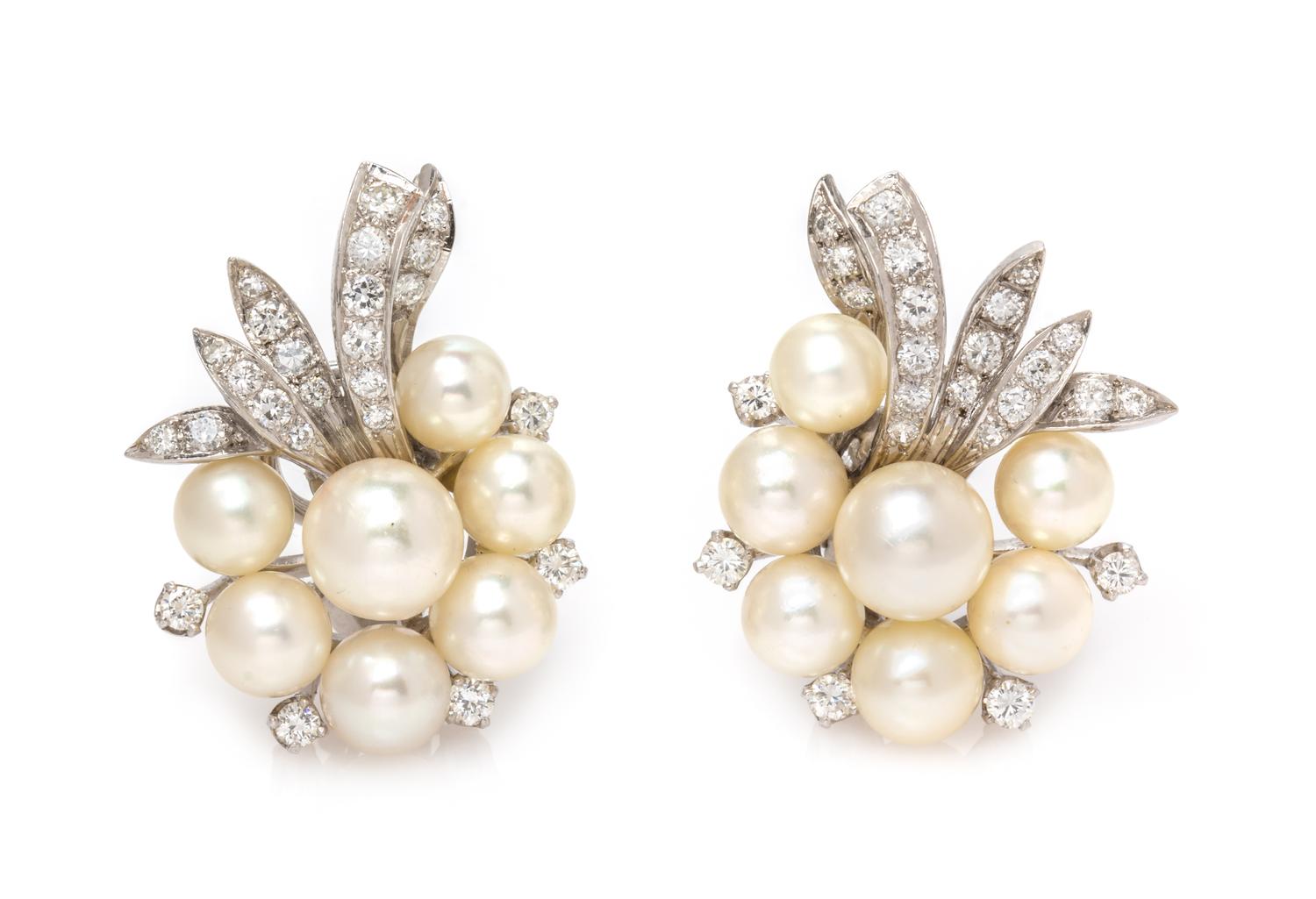 A Pair of White Gold, Diamond and Cultured Pearl Earclips, 10.30 dwts.